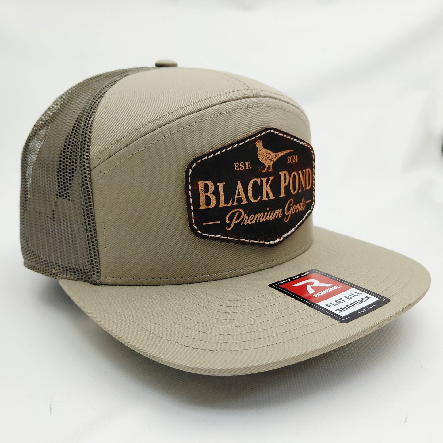 Left angled view of Black Pond pheasant leather patch Richardson snapback hat