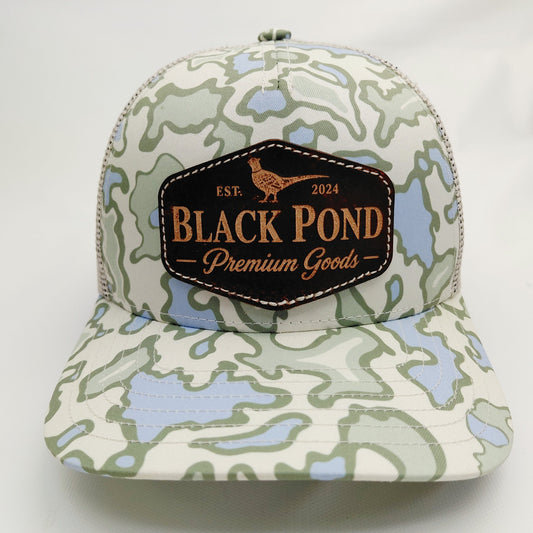 Front view of Black Pond pheasant leather patch Richardson 112 hat in light green blue camouflage