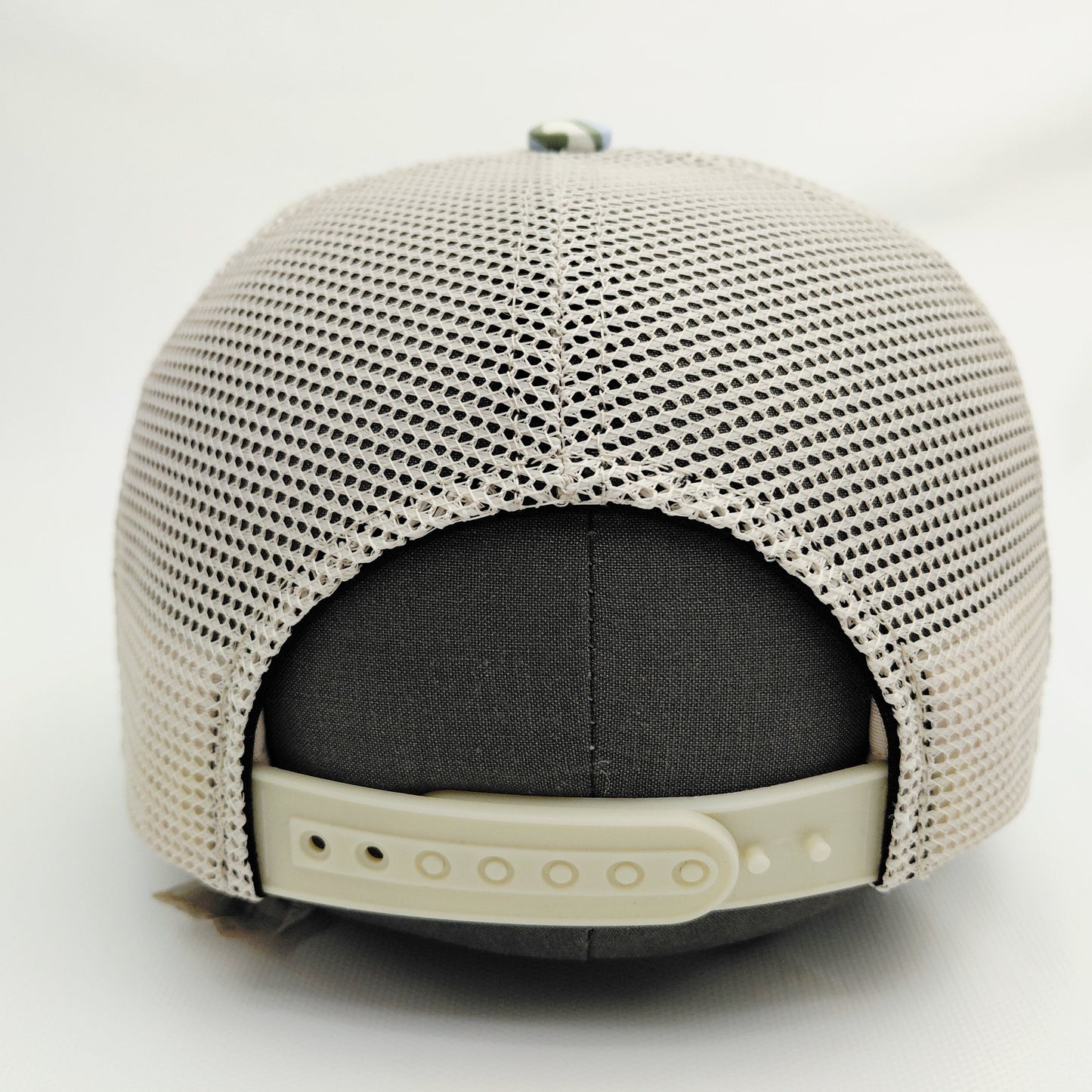 Cream mesh back and adjustable snap closure of Black Pond SOBRO seven-panel hat