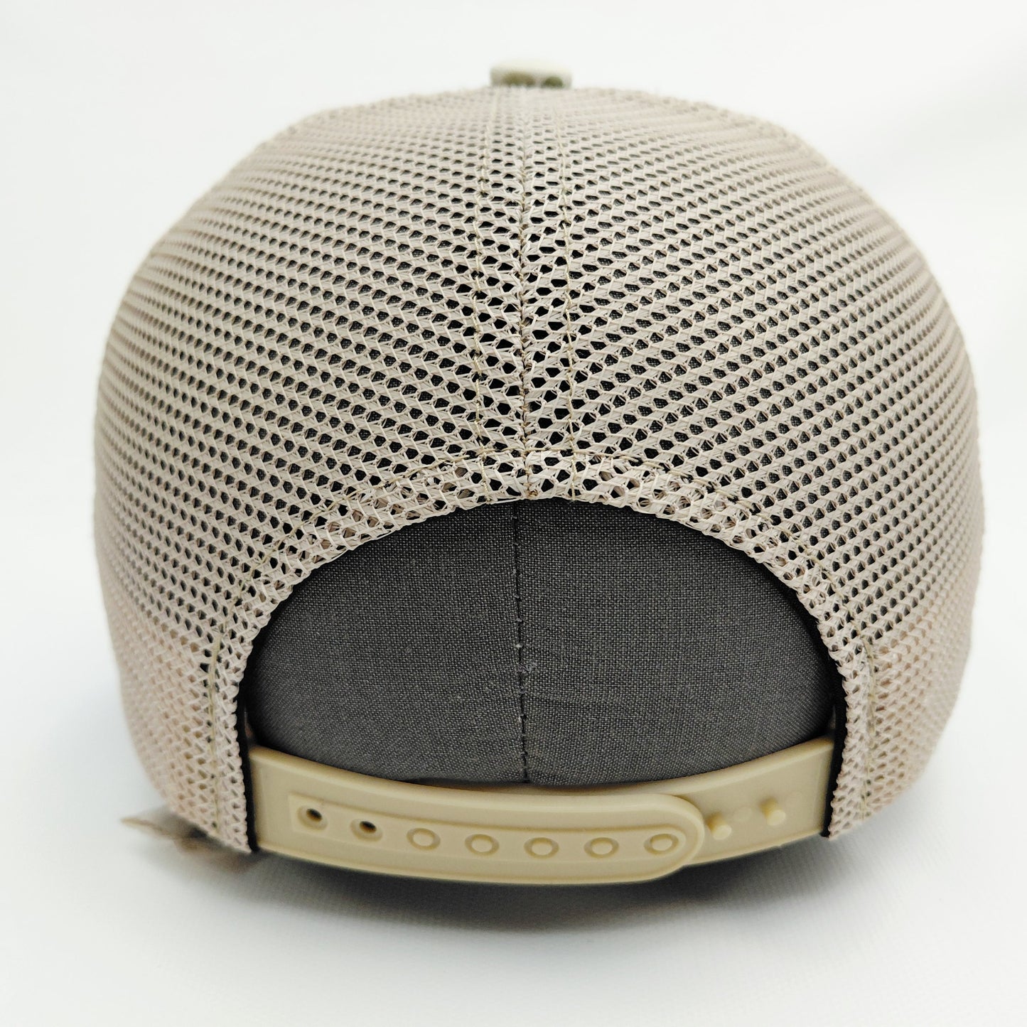 Cream mesh back and adjustable snap closure of Black Pond SOBRO seven-panel tan camouflage hat