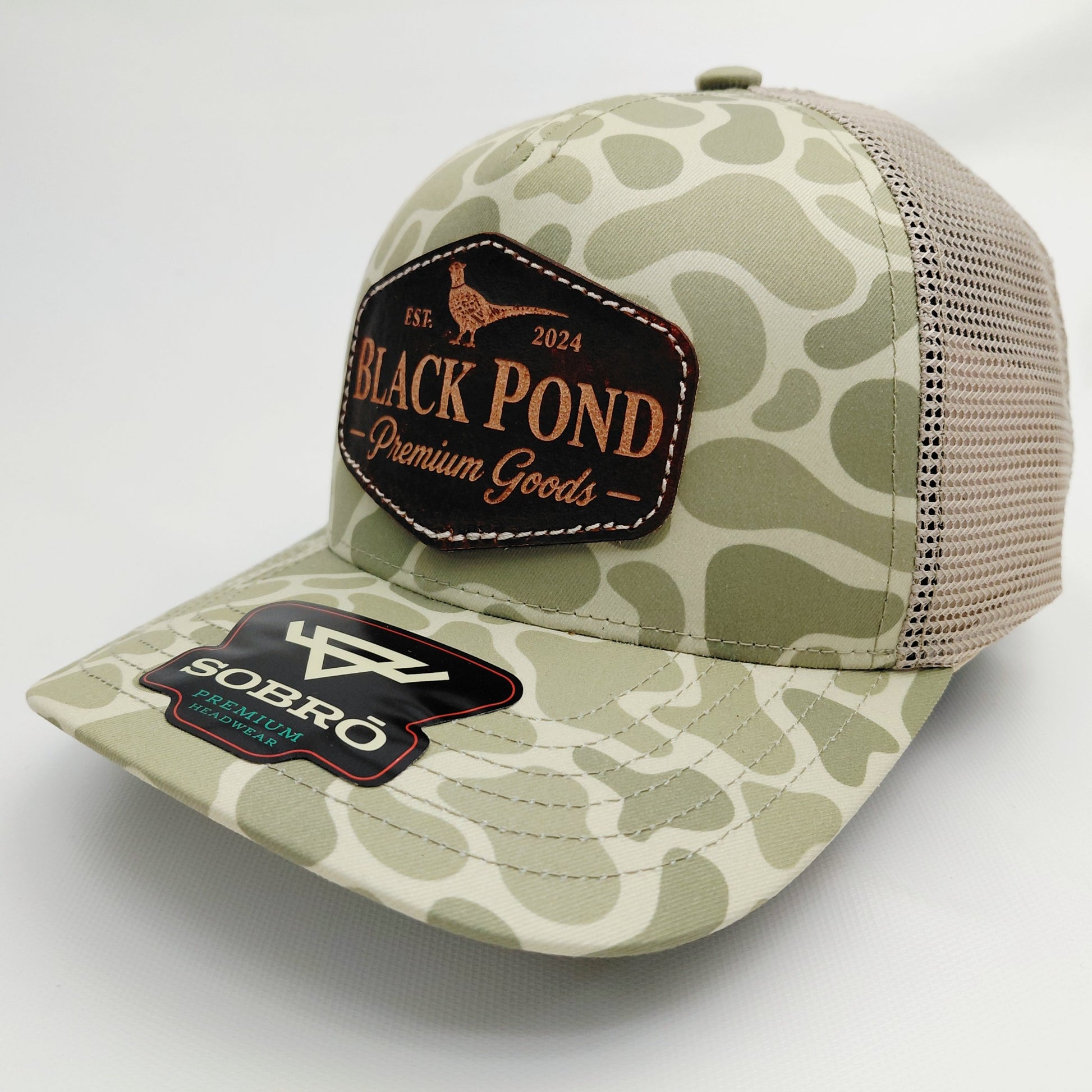 Black Pond SOBRO olive camo trucker hat angled view