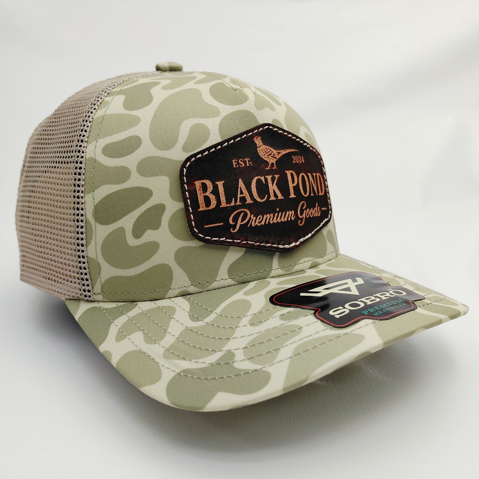 Black Pond SOBRO olive camo trucker hat side view