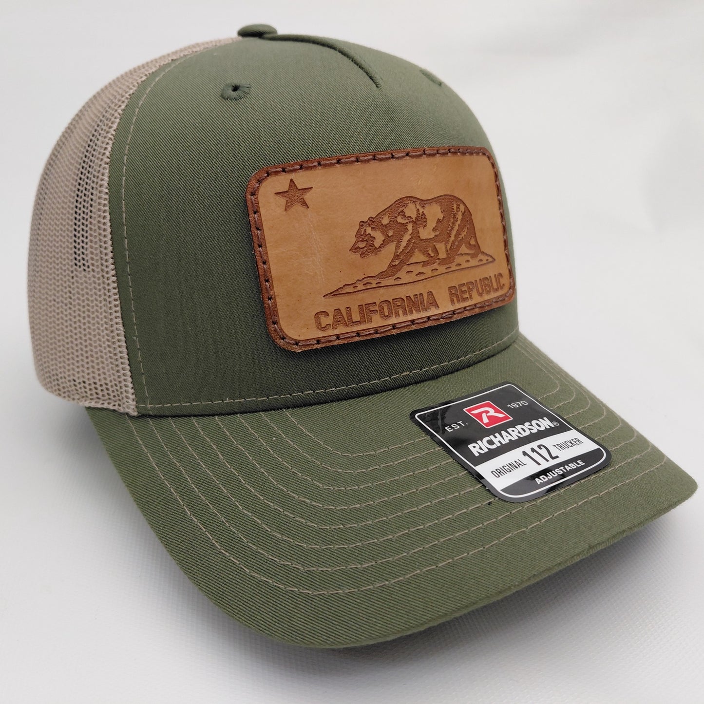 Army green Richardson 112 California Republic leather patch trucker hat opposite angle