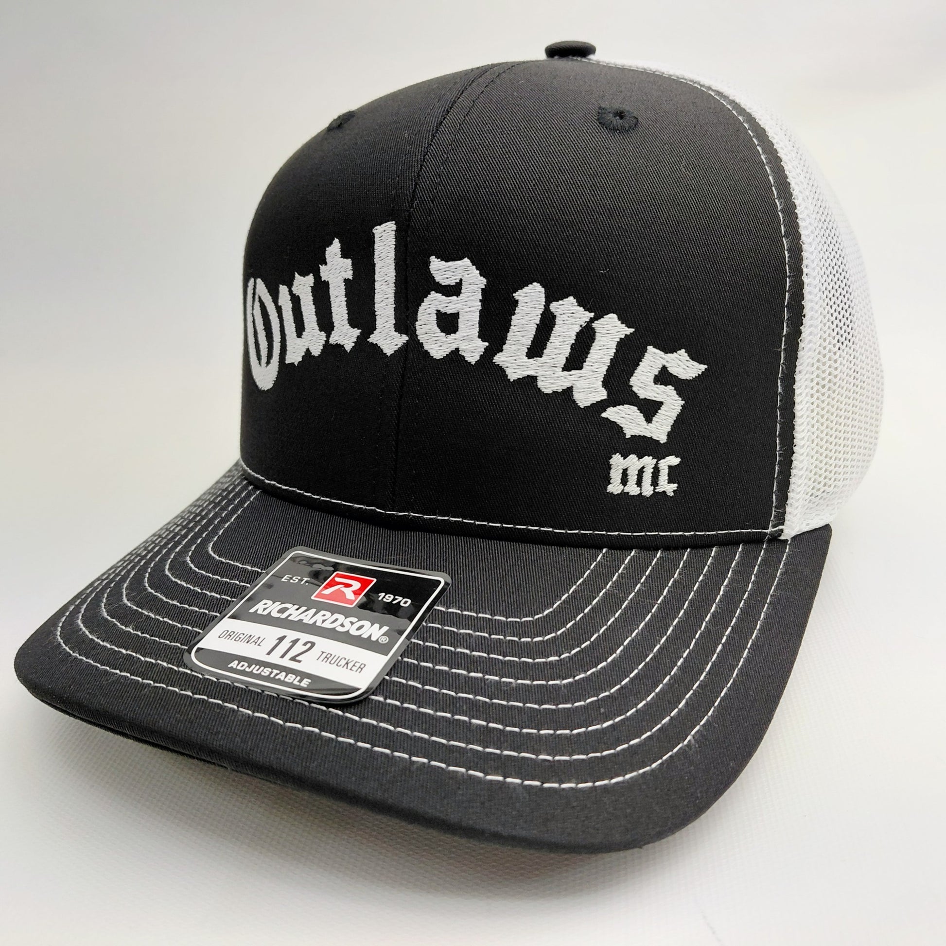 Outlaws MC Richardson 112 black and white trucker hat front view