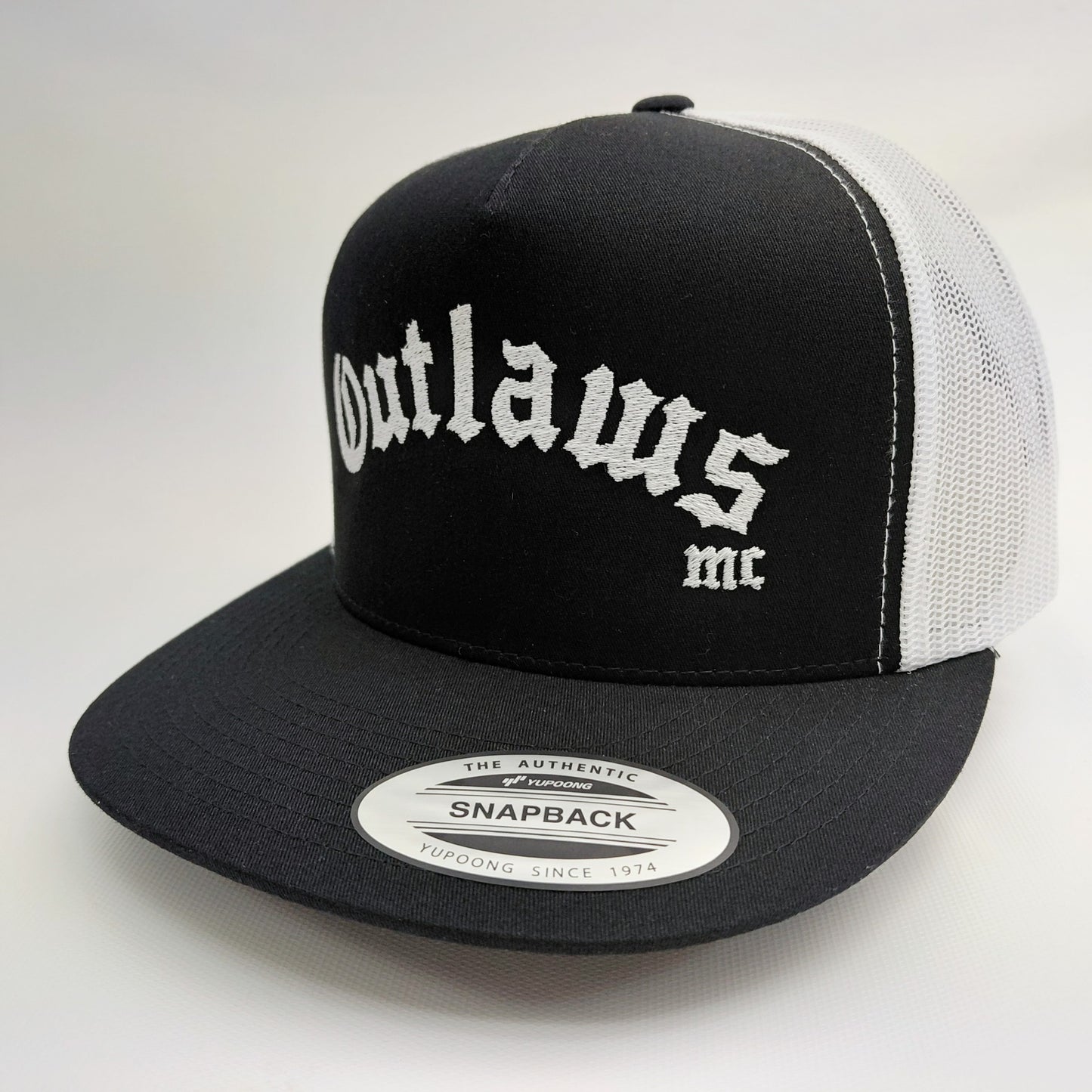 Outlaws MC embroidered trucker hat right angle view