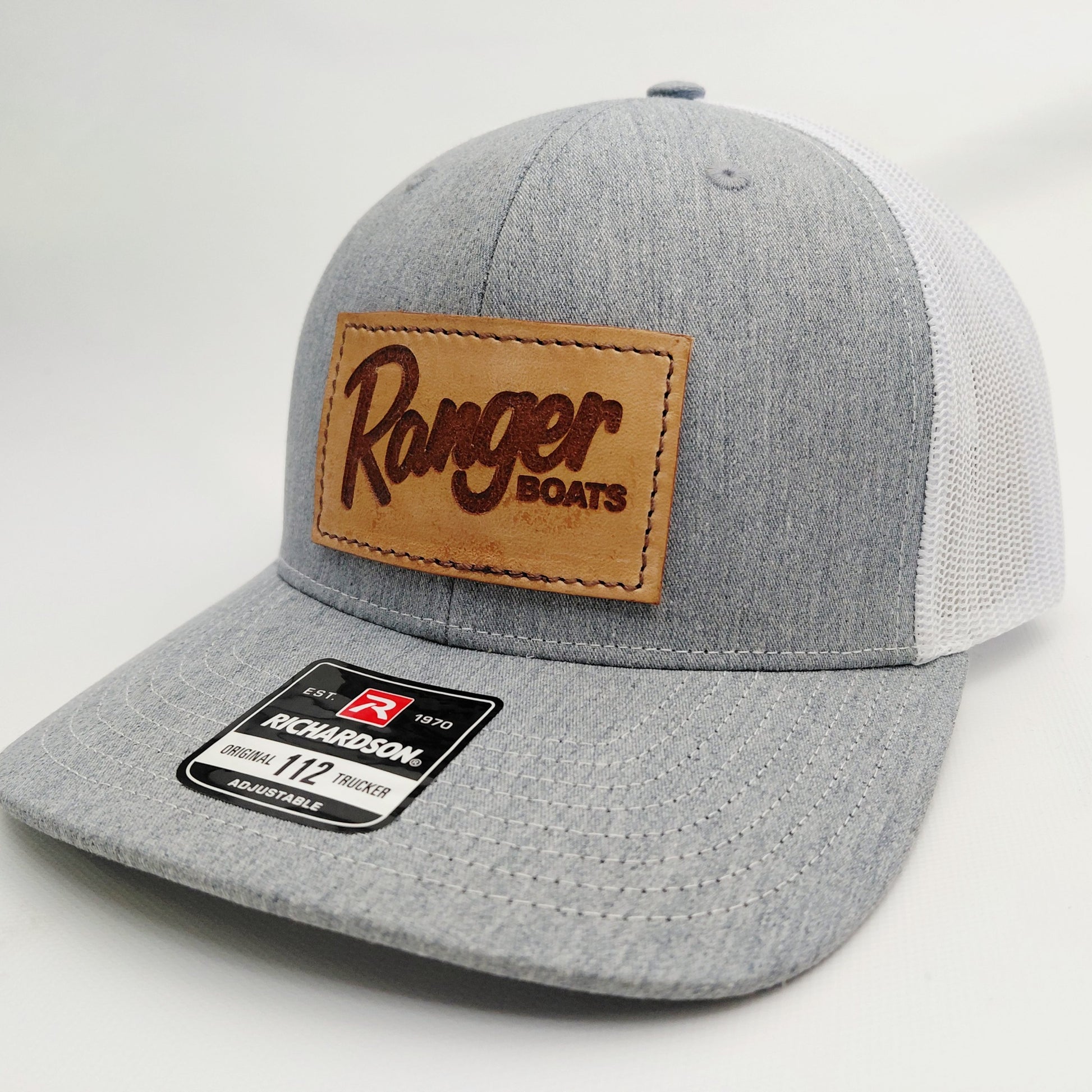 Left angled view of Ranger Boats leather patch Richardson 112 trucker hat
