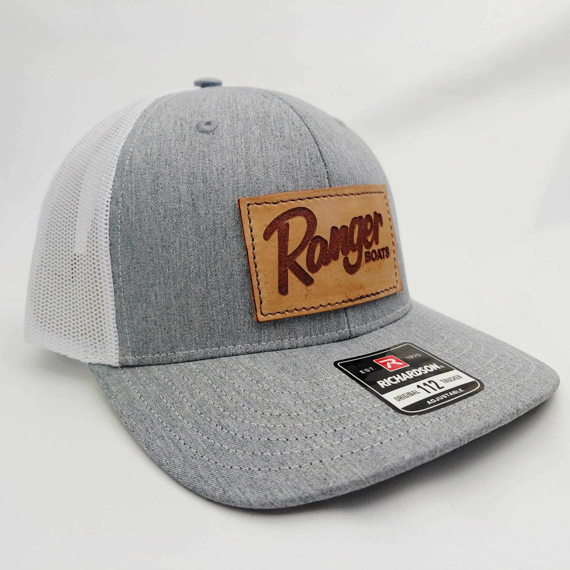 Right angled view of Ranger Boats leather patch Richardson 112 trucker hat