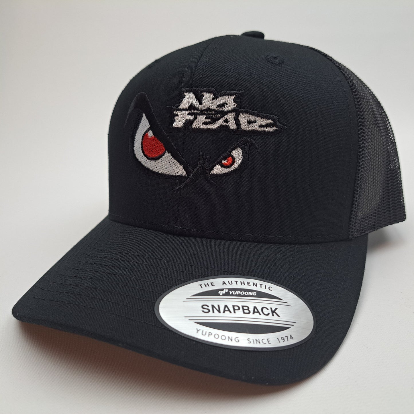 No Fear Angry Eyes Yupoong Curved Bill Mesh Snapback Trucker Baseball Hat Cap Black